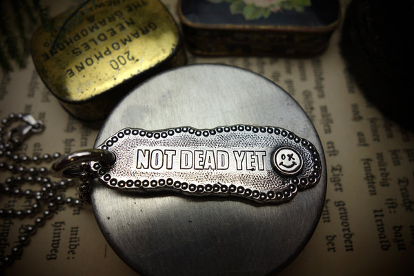 Silver Pendant „NOT DEAD YET“