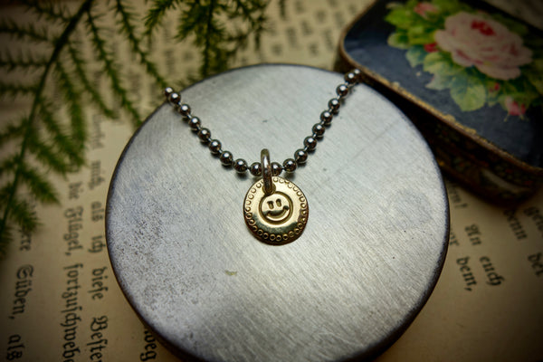 Gold Charm „KEEP SMILING“