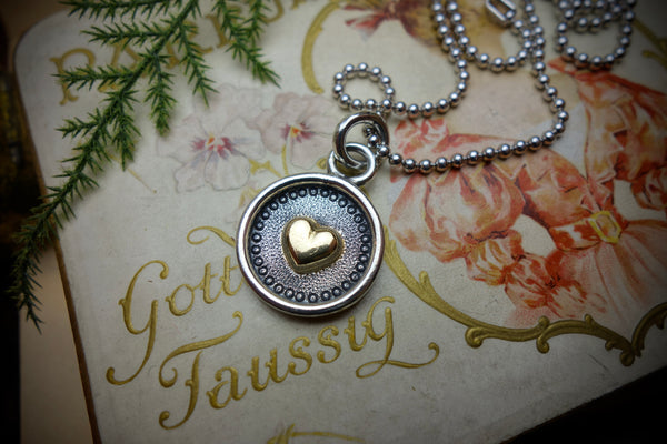 Silver Pendant „GOLDEN HEART“