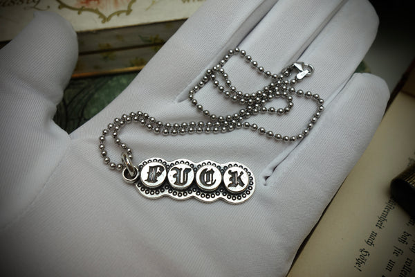 Silver Pendant „FUCK“