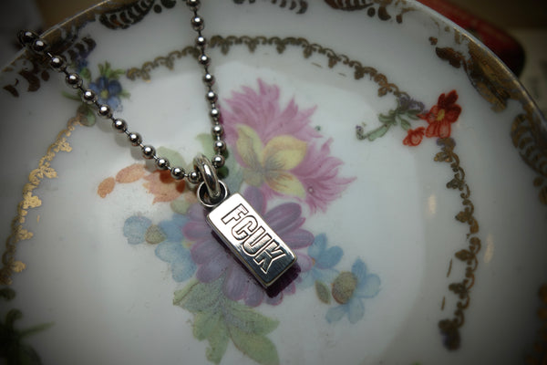 Silver Pendant „FCUK“