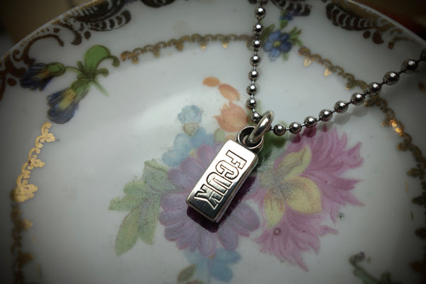 Silver Pendant „FCUK“