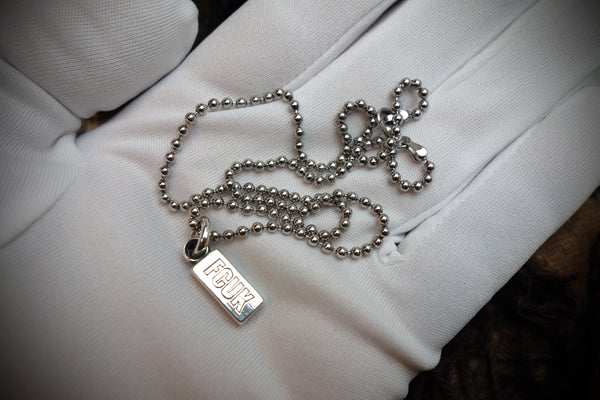 Silver Pendant „FCUK“
