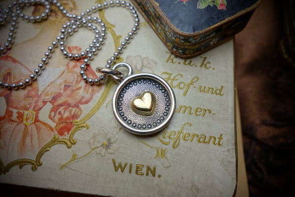 Silver Pendant „GOLDEN HEART“