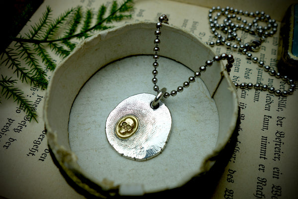 Silver Pendant „GOLDEN SKULL“