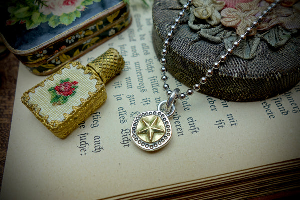 Silver Pendant „GOLDEN STAR“