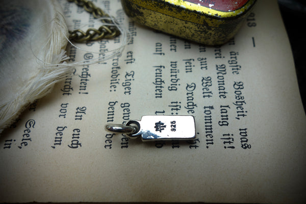 Silver Pendant „FCUK“