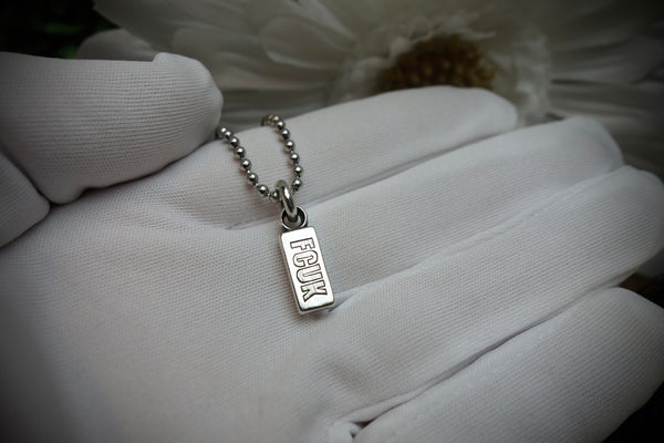 Silver Pendant „FCUK“