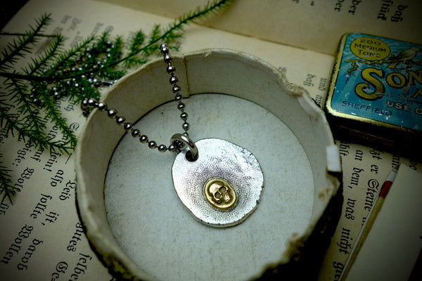 Silver Pendant „GOLDEN SKULL“