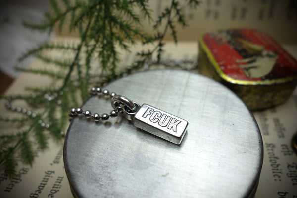 Silver Pendant „FCUK“